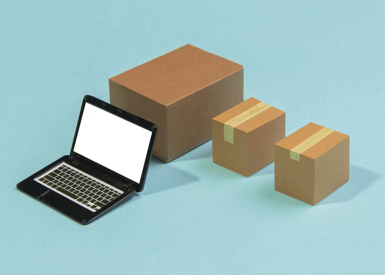 high-angle-laptop-boxes-arrangement