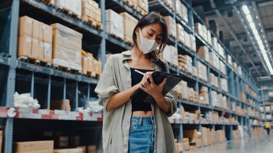 young-asian-businesswoman-manager-wearing-face-mask-warehouse-using-digital-tablet-checking-inventory